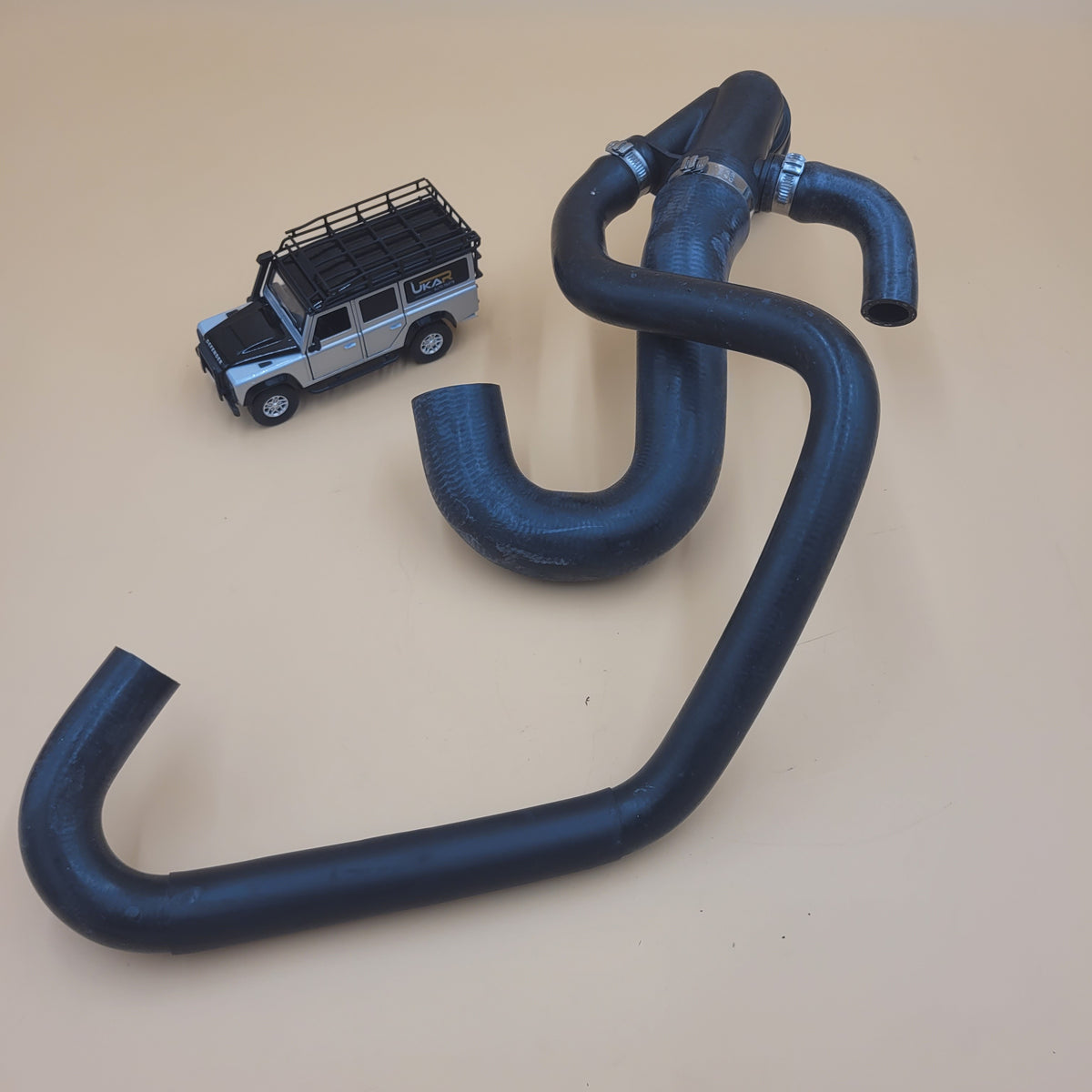 LR Discovery II V8 Coolant Hose From Pump Thermostat to Heater PEH000080