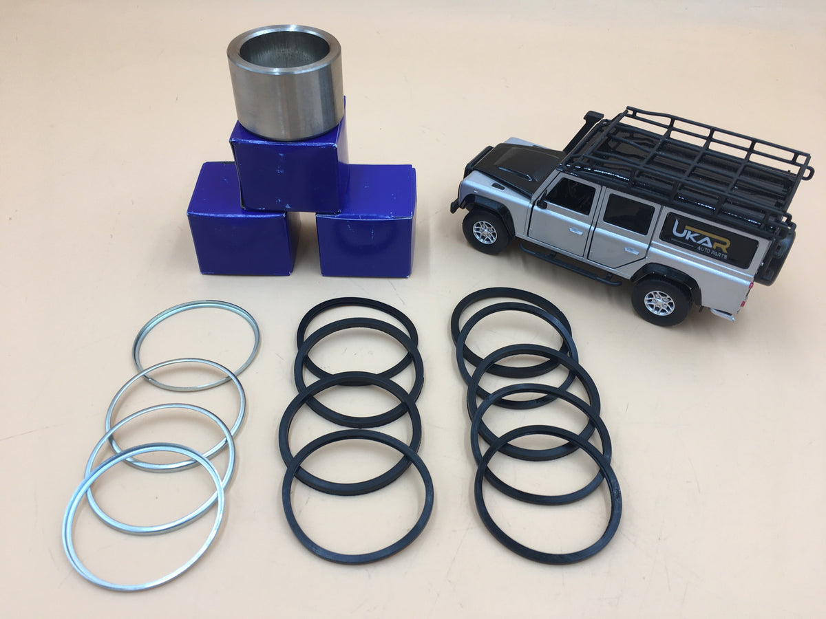 LR DEFENDER 94- Front Caliper Repair Kit Contains Four Pistons STC1280