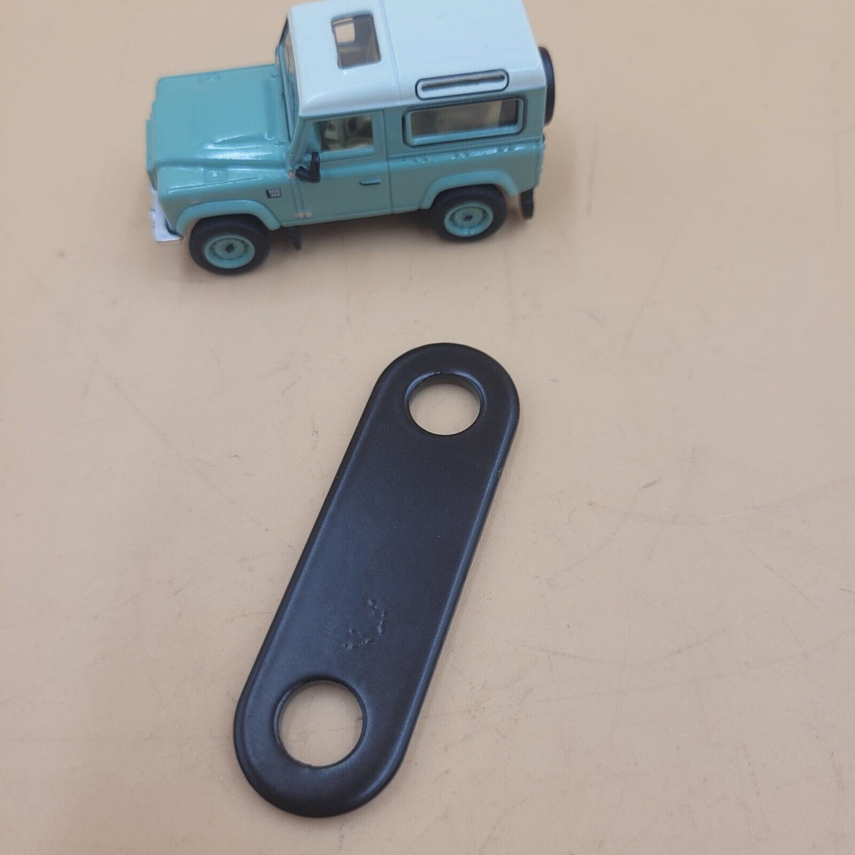 LR DEFENDER 93- Spacer for Windscreen Hinge LR016689