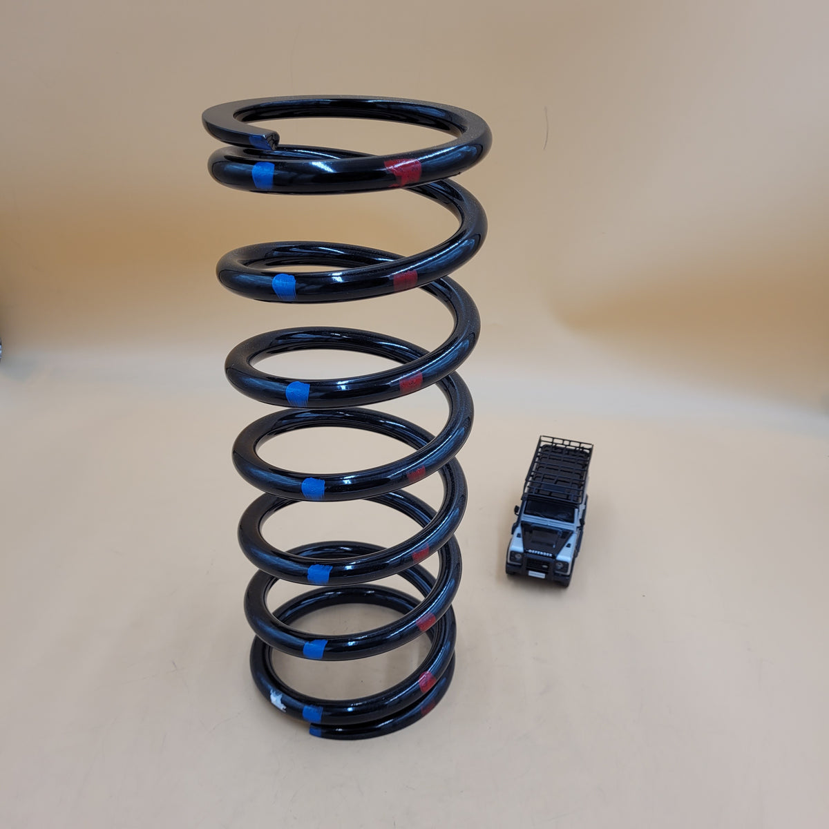 Defender 110/130 Front Driver HD Coil Spring (Blue/Red) Part NRC9448