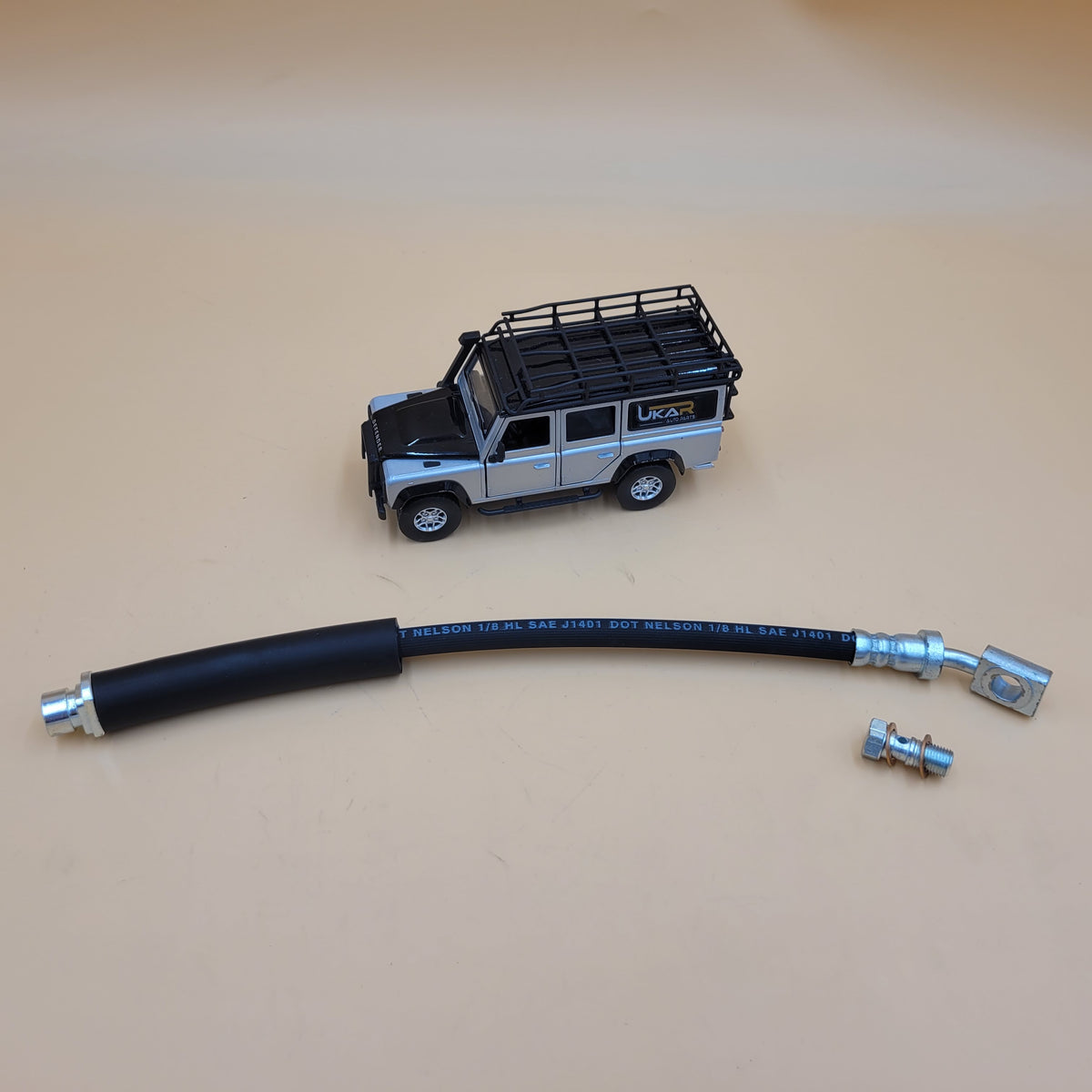 LR DISCOVERY III IV RR SPORT 06-13 Rear Outer Brake Hose to Caliper LR018111