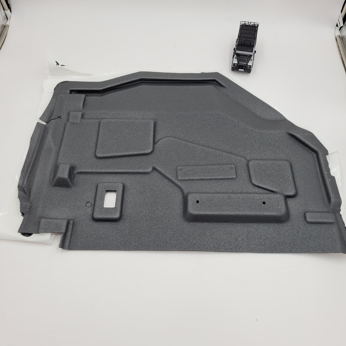LR DEFENDER 02- REAR LEFT HAND DOOR WATER SHEDDER ELD500410G