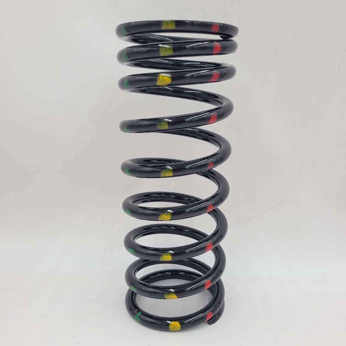 LR DEFENDER 90' Rear Driver Coil Spring (Green/Red/Yellow) Part RKB101230