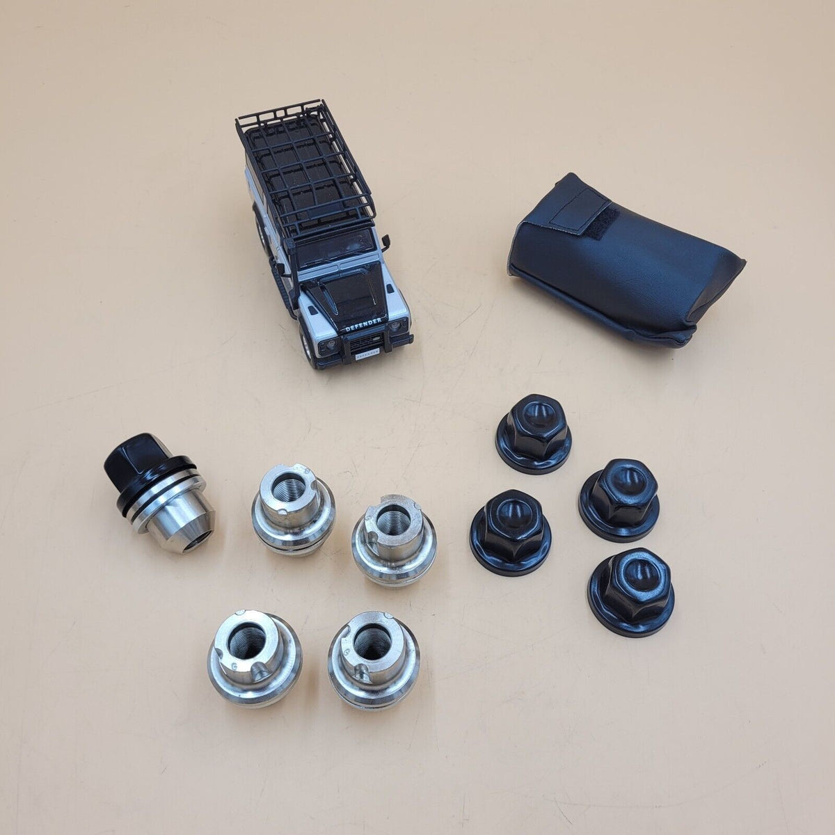 LAND ROVER DEFENDER 2007 ONWARDS BLACK LOCKING WHEEL NUT KIT PART DA3548