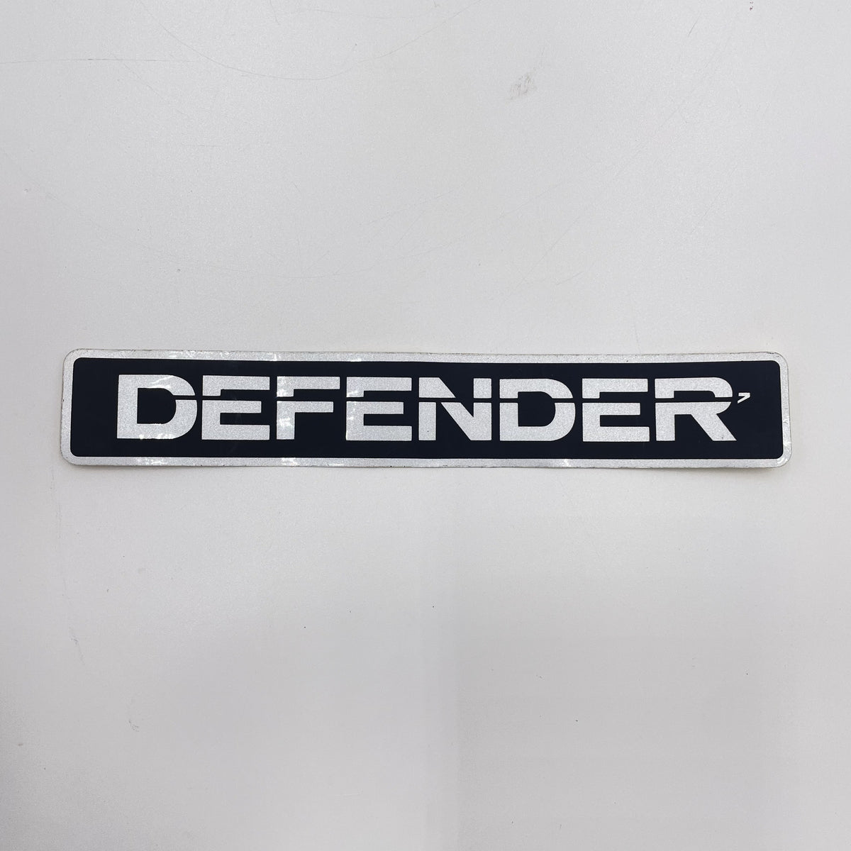 LR DEFENDER Front or Rear Emblem Sticker Silver/Black 9x1.5in / 230x37mm