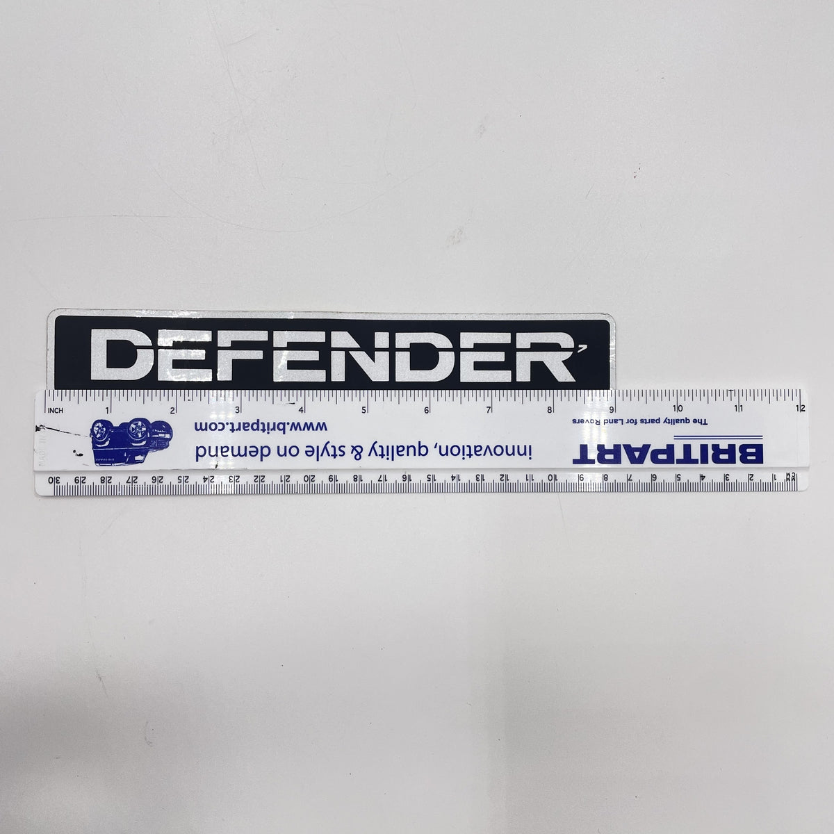 LR DEFENDER Front or Rear Emblem Sticker Silver/Black 9x1.5in / 230x37mm