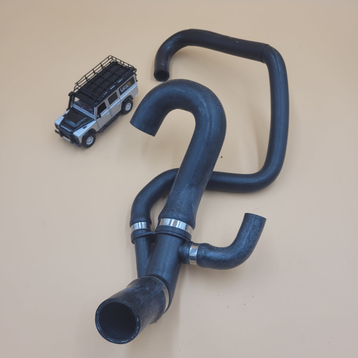 LR Discovery II V8 Coolant Hose From Pump Thermostat to Heater PEH000080