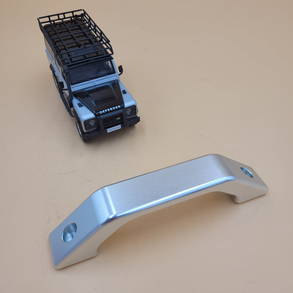 DEFENDER INTERIOR DOOR HANDLE SILVER - BRITPART Part DA8936