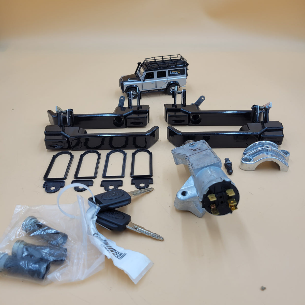 Land Rover DEFENDER FRONT AND REAR DOOR HANDLE GLOSS BLACK KIT Part UKAR135423