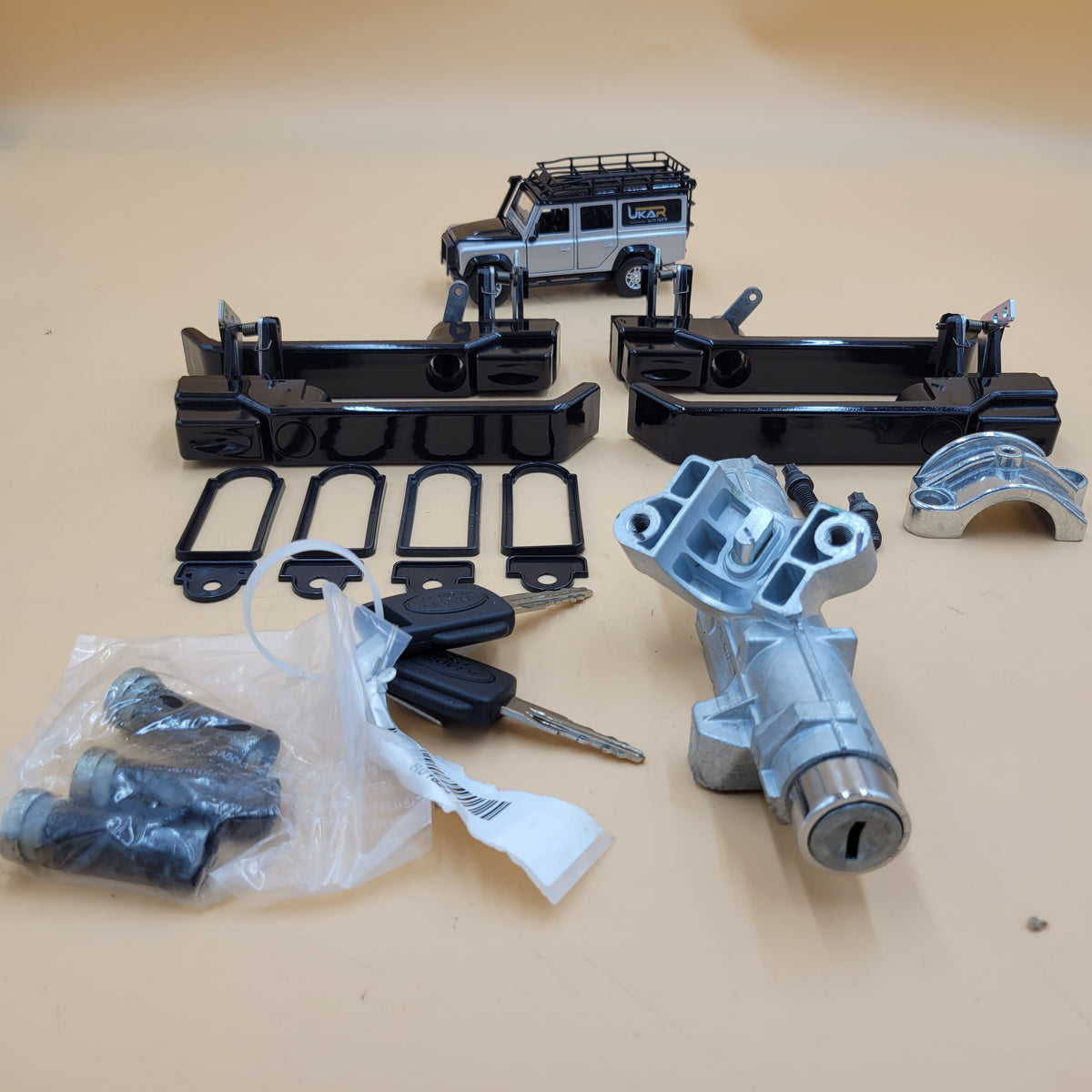 Land Rover DEFENDER FRONT AND REAR DOOR HANDLE GLOSS BLACK KIT Part UKAR135423
