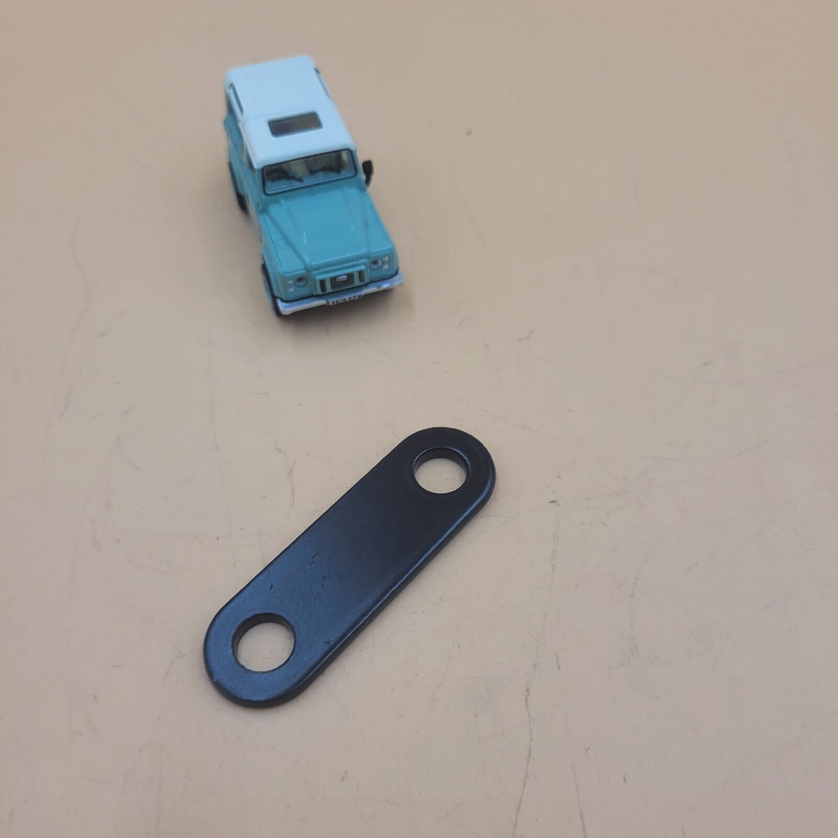 LR DEFENDER 93- Spacer for Windscreen Hinge LR016689