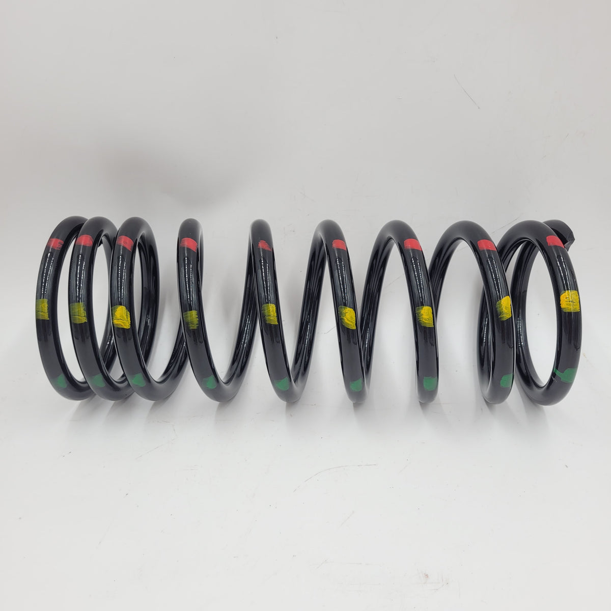 LR DEFENDER 90' Rear Driver Coil Spring (Green/Red/Yellow) Part RKB101230