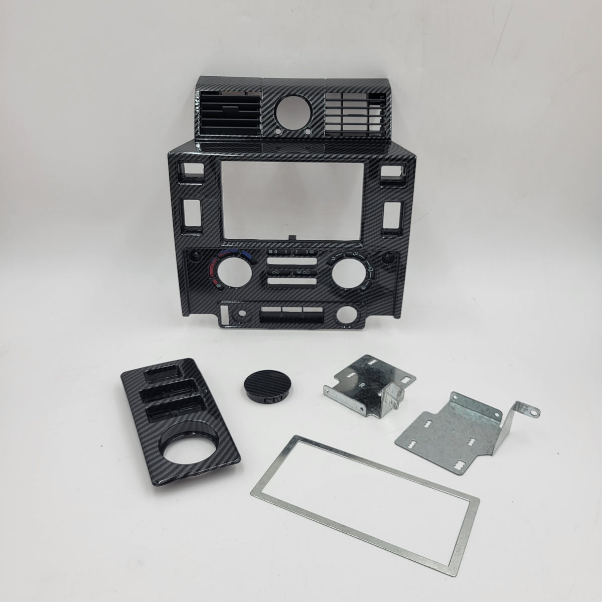 LR DEFENDER 07-16 STEREO DOUBLE DIN MOUNTING CARBON KIT BA2714