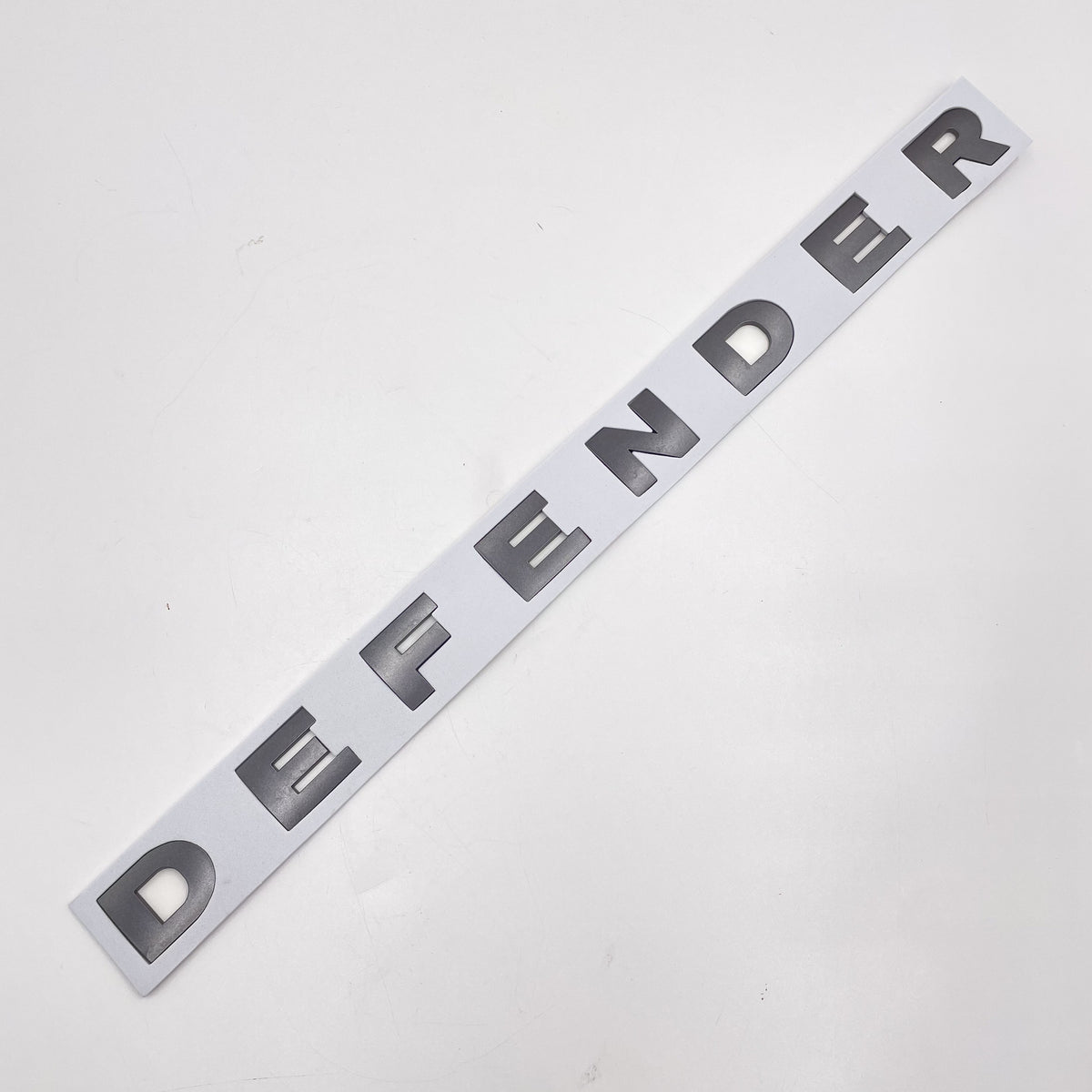 LR DEFENDER -16 FRONT GREY LETTERS HOOD BADGE FT-LRE031G