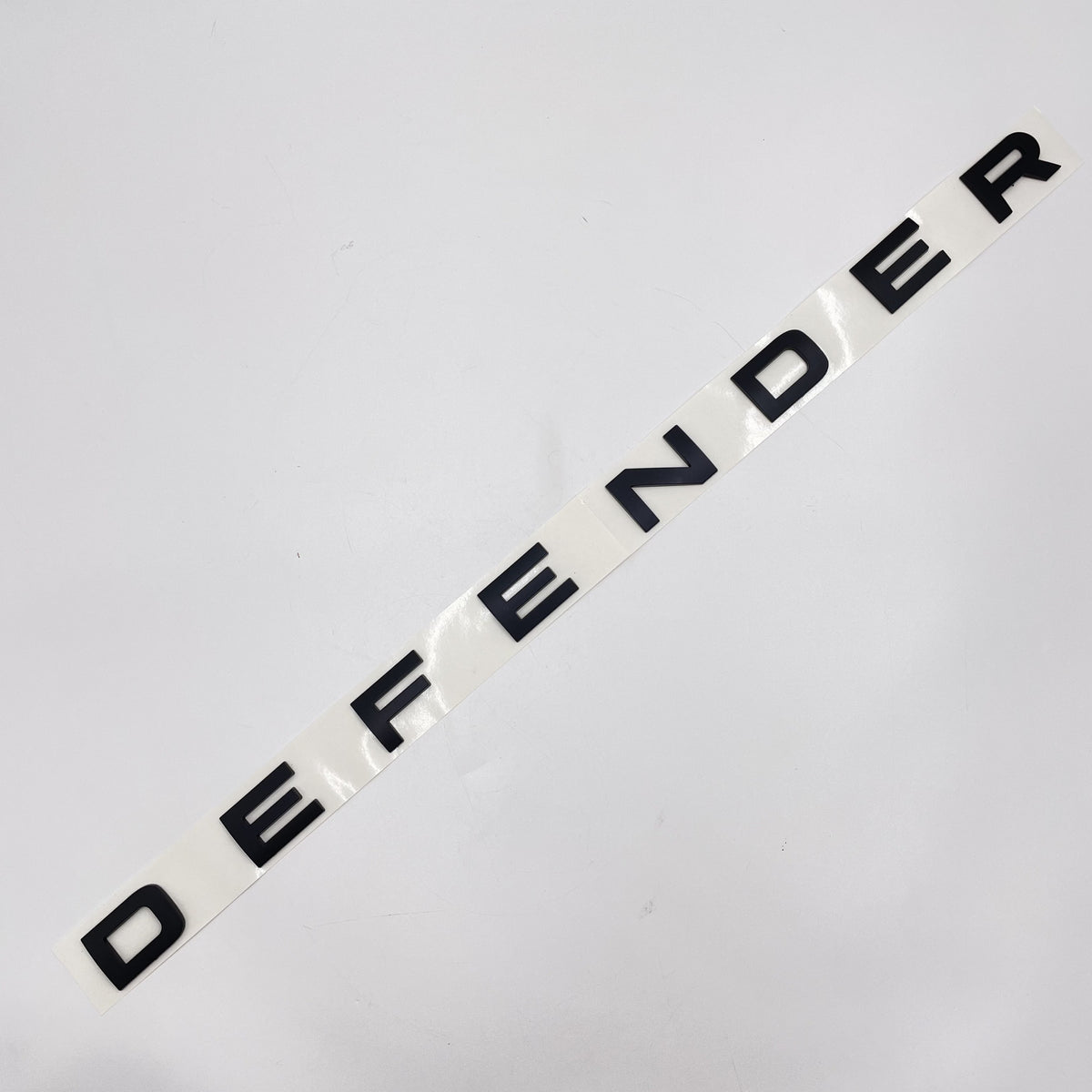 LR DEFENDER 20-22 FRONT MATT BLACK LETTERS HOOD BADGE FT-LRE041