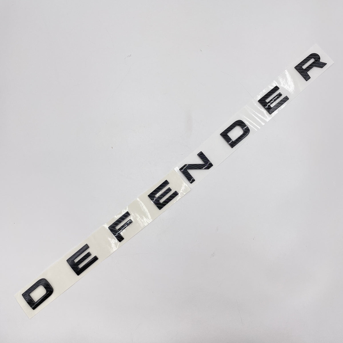 LR DEFENDER 20-22 FRONT CARBON LETTERS HOOD BADGE FT-LRE044