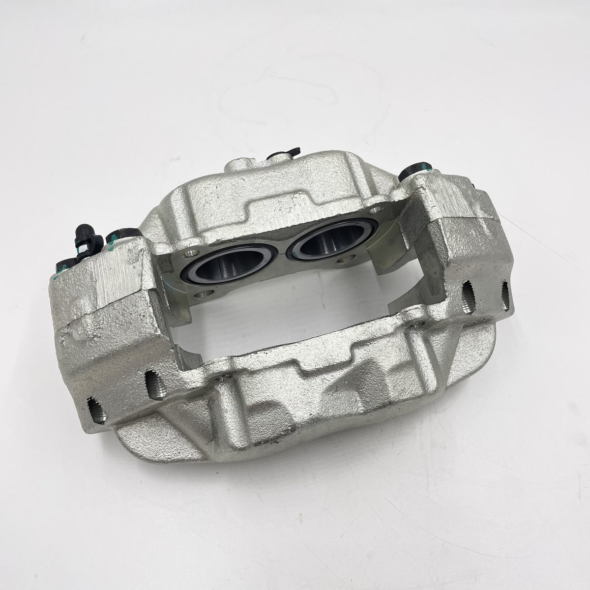 LR DEFENDER 94- Front LH Brake Caliper With Non-Vented Disc SEB500450