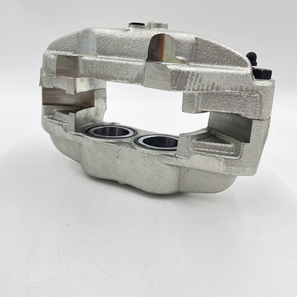 LR DEFENDER 94- Front LH Brake Caliper With Non-Vented Disc SEB500450